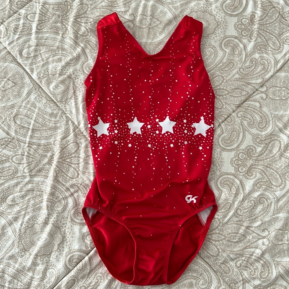 Adult extra small red GK elite leotard.